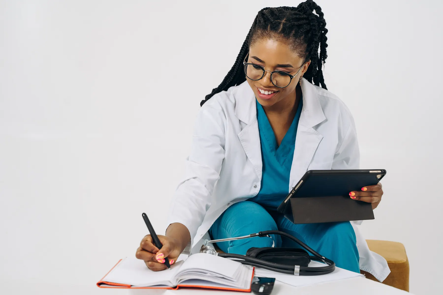 A healthcare professional ready to respond to a patient inquiry.